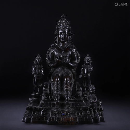 A Chinese Carved Rosewood Maitreya
