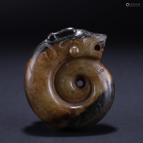 A Chinese Carved Russet Jade Pig Dragon Shang Dyn.