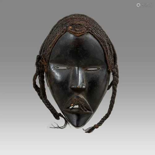 African Ivory Coast Dan Wooden Mask With False hair.