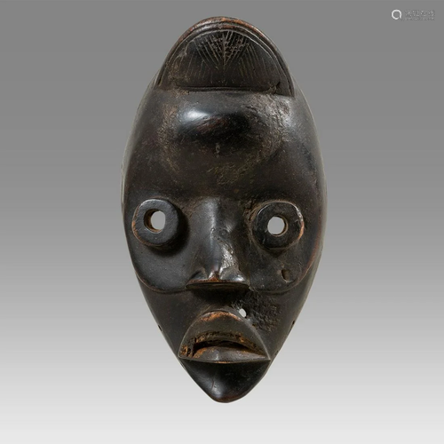 African Ivory Coast Dan Wooden Mask.