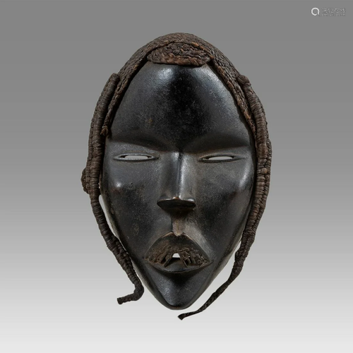 African Ivory Coast Dan Wooden Mask.