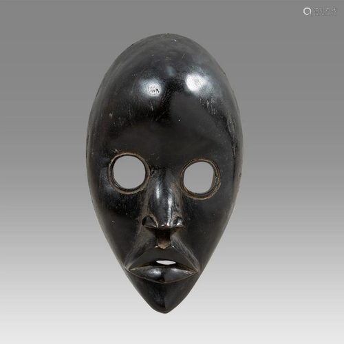 African Ivory Coast Dan Wooden Mask.