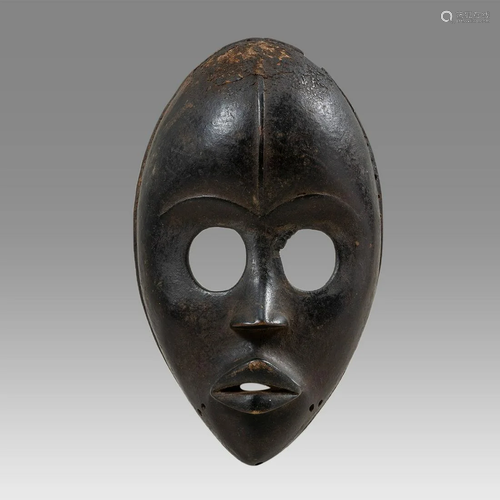 African Ivory Coast Dan Wooden Mask.