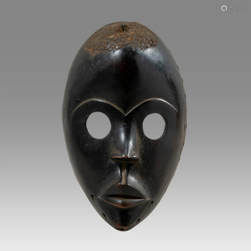 African Ivory Coast Dan Wooden Mask.