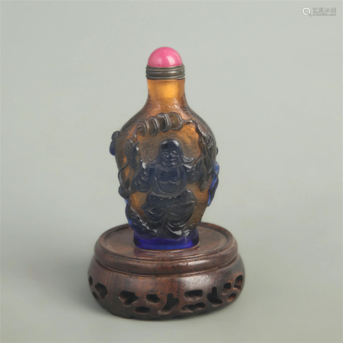 A FINE CHARACTER CARVING GLASS SNUFF BOTTLE