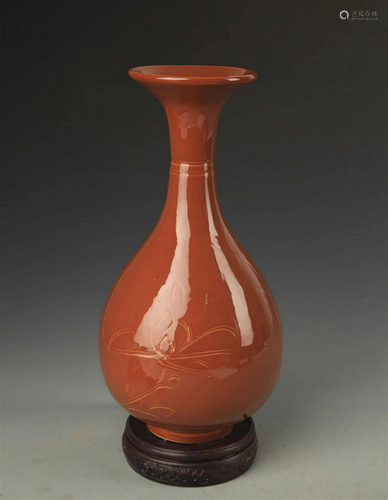 A DING KILN STYLE LOTUS CARVING YU HU CHUN VASE