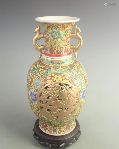 A YELLOW GROUND DRAGON CARVING PORCELAIN VASE