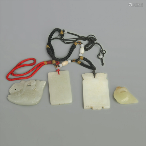 GROUP OF FOUR JADE PENDANT