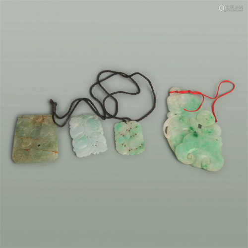 GROUP OF FOUR JADE PENDANT