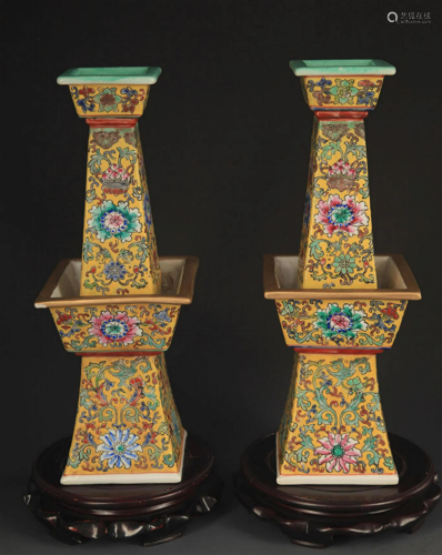 PAIR OF YELLOW GROUND CANDLESTICK
