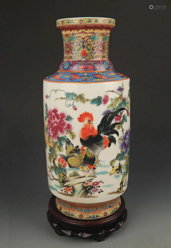 A FAMILLE ROSE STORY PAINTED PORCELAIN VASE