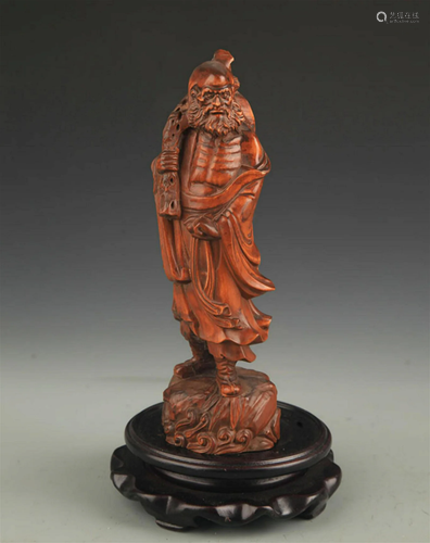 A BOX WOOD FIGURE OF BODHIDHARMA