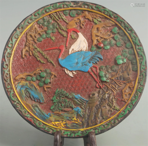A FINE COLORED RED CARVED LACQUER DRAGON PLATE