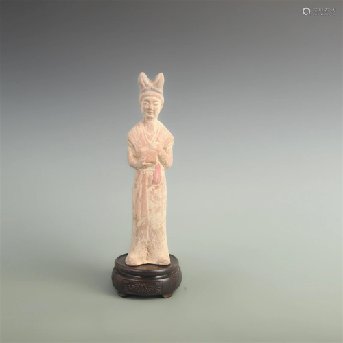 A FINE POTTERY MADE FEMALE FIGURE