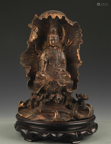 A BRONZE LOTUS GUAN YIN STATUE