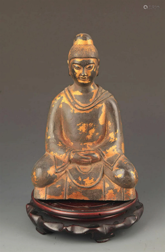 A FINELY CARVED BUDDHA FIGURE