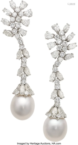 55160: South Sea Cultured Pearl, Diamond, Platinum Ear
