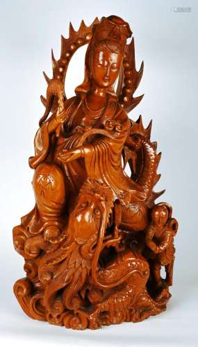 Grand sculpture en bois ajouré d'une Guyanjin.