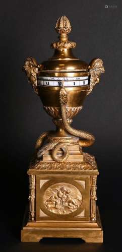 Pendule en bronze doré et ciselé d'une urne