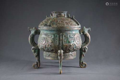 A Chinese Bronze Beast Pattern Three Feet Container