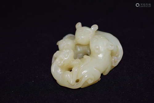 A Yellow Jade Four Beast Ornament