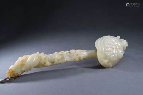 A White Jade Ruyi with Dragon, Phoenix, Plum Flower Ornament