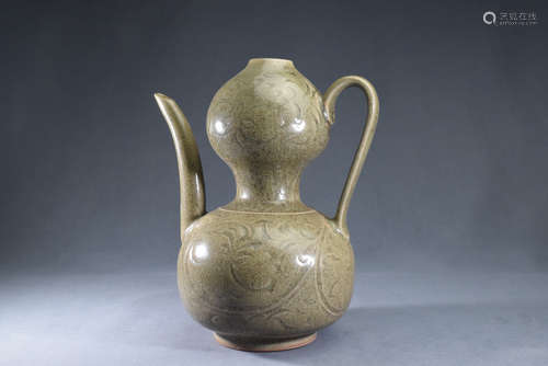 A Yaozhou Kiln Cavred Porcelain Poy