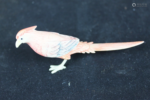 Hand carved bird figure