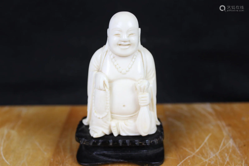 Hand carved buddha figure