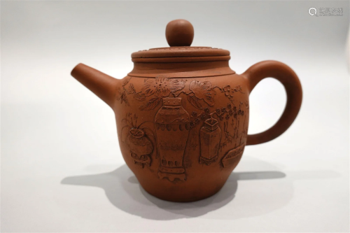 A YiXing teapot with flowers design. Republic of China.