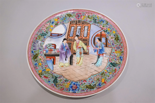 A famille rose plate with colourful landscape and figures de...