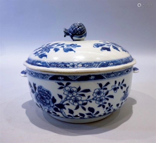 A blue and white flowers bowl with cover and handles design....