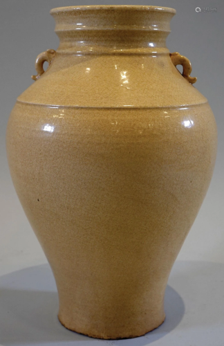 A white-glazed vase with handles design. Tang Dynasty.