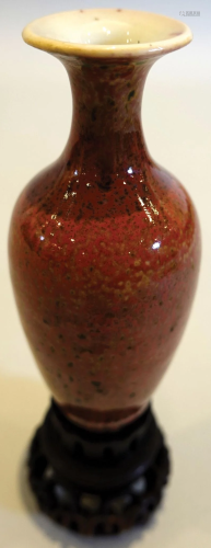 A cowpea-red-glazed vase, with mahogany stand. KangXi six-ch...