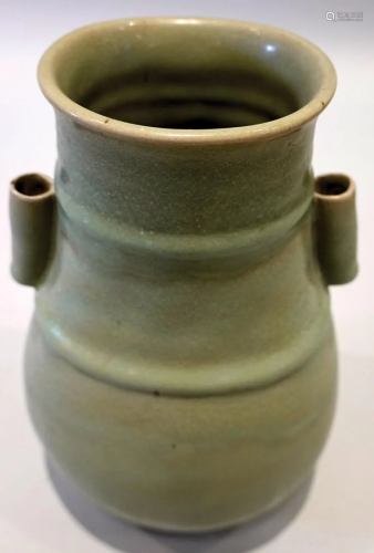 A LongQuan ware celadon vase with handles design. Yuan(Ming)...