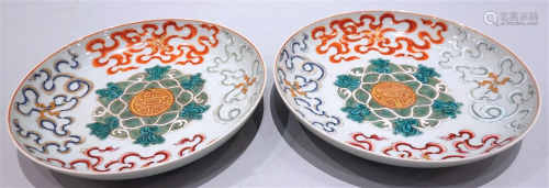 A pair of famille rose plates. QianLong six-character mark.