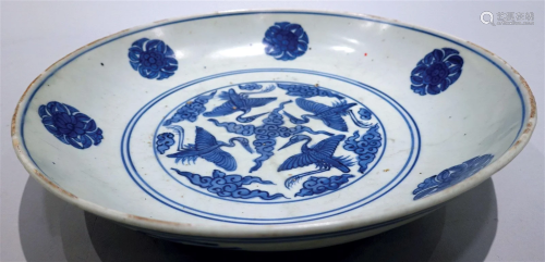 A blue and white large plate with cloud and crane design. Ji...