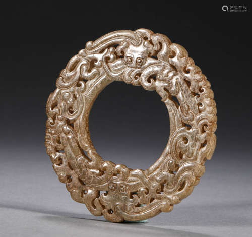 During the Warring States period, Hetian jade dragon pattern...