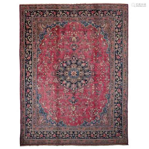 AN ORIENTAL CARPET