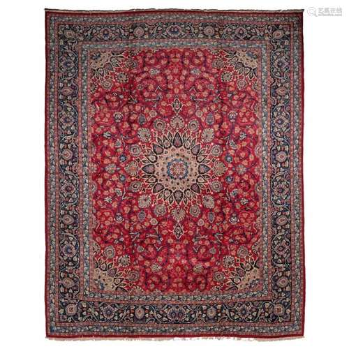 AN ORIENTAL CARPET