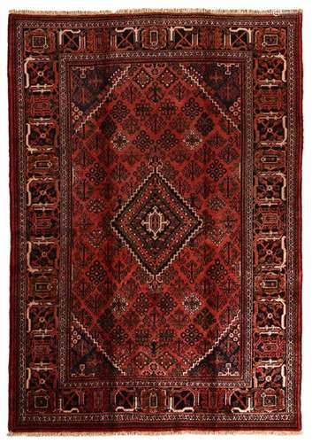 AN ORIENTAL CARPET