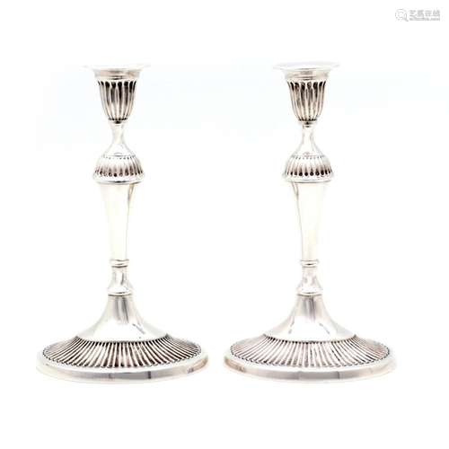 A PAIR OF CANDLESTICKS