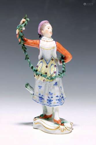 Rare porcelain figure of a dancer with a garland