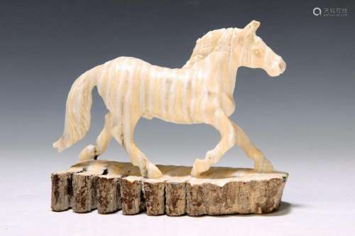 Horse sculpture made from a mammoth tooth, workshop