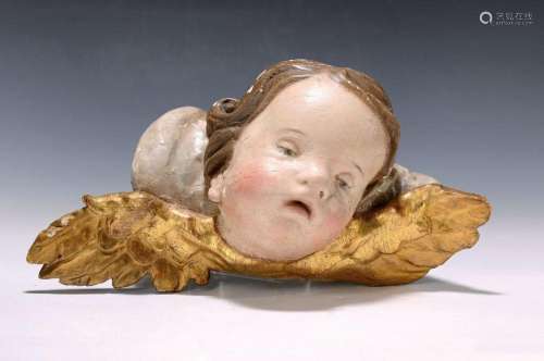 Head of a putti, South German, around 1740-50,carved lime