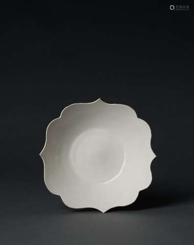 A DING WHITE-GLAZED FOLIATE RIMMED BOWL, LATE TANG -FIVE DYN...