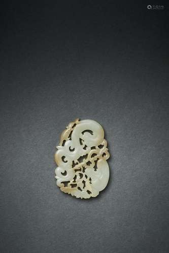 A CELADON PIERCED JADE PLAQUE, QING DYNASTY (1644-1912)