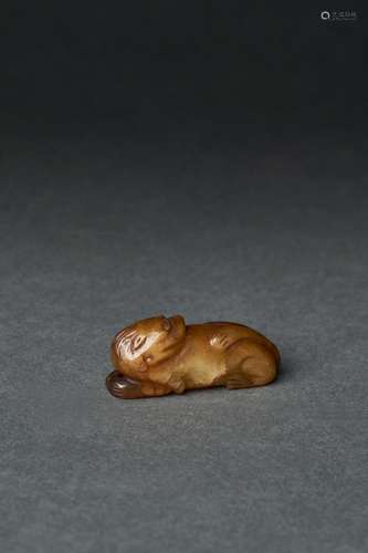 A RARE YELLOW JADE TIGER, SONG/MING DYNASTY, 13TH-14TH CENTU...