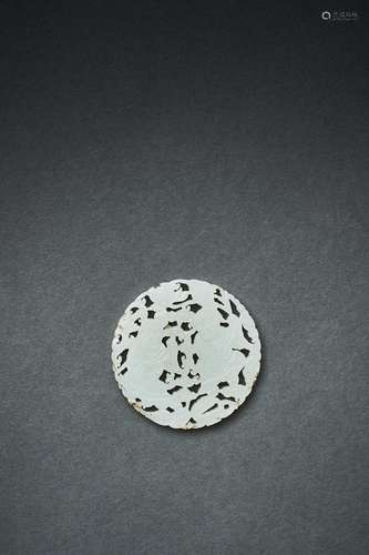 A WHITE JADE CARVED ROUNDED PENDANT OF HEHEERXIAN, MING DYNA...