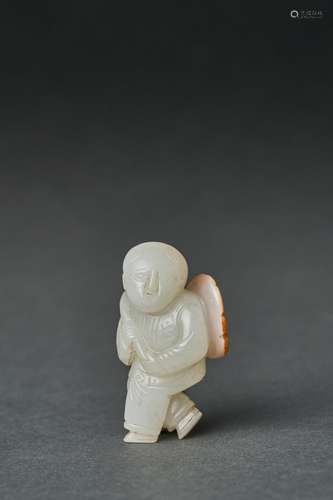 A WHITE JADE CARVED FIGURE OF BOY, SONG DYNASTY (960-1279)